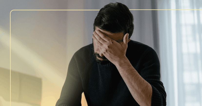 man having trouble sleeping because of racing thoughts