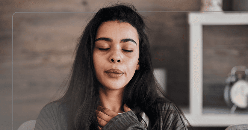 woman with hyperthyroidism and a mental health condition doing deep breathing