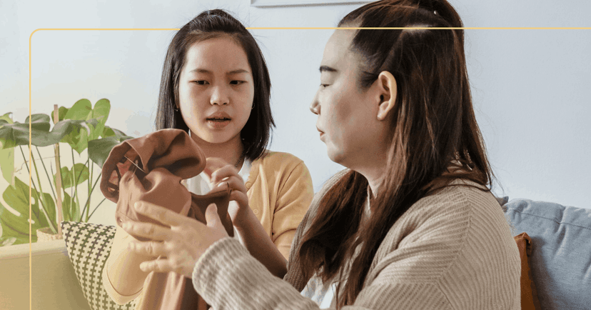 young girl with autism experiencing sensory sensitivities