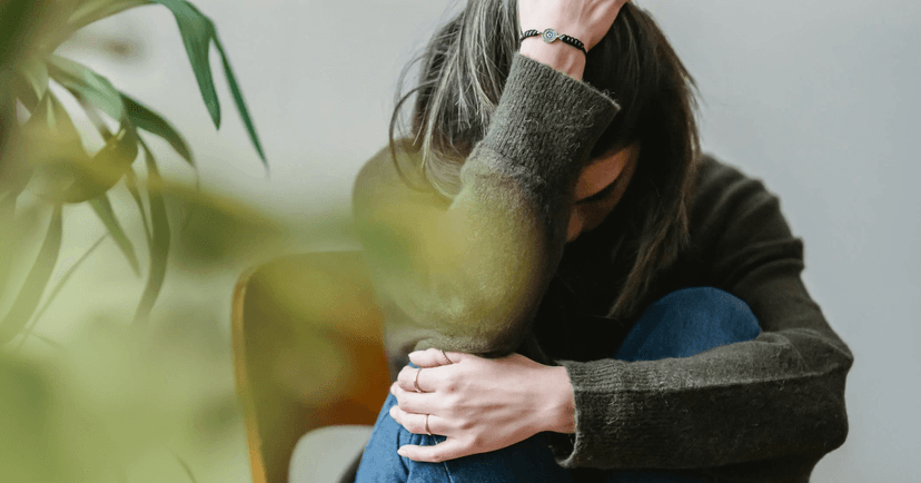 woman feeling afraid of being home alone