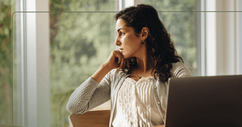woman procrastinating due to constant fatigue