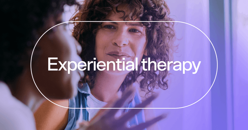 woman acting out an emotion with her therapist with text 'Experiential therapy'