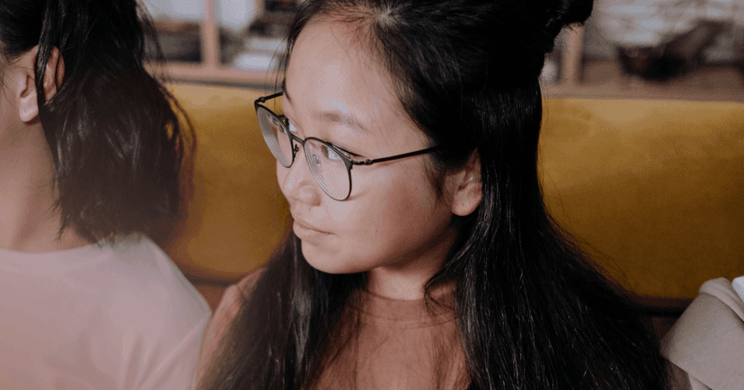 young girl experiencing emotional parentification by listening to adult problems