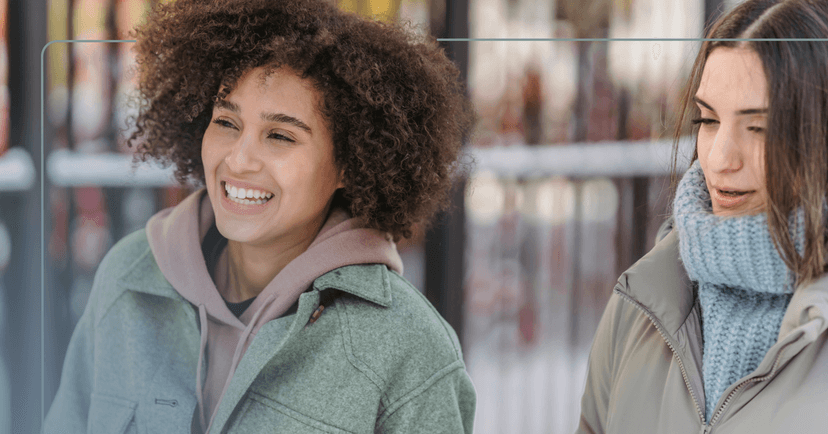 woman with a friend making jokes at her own expense