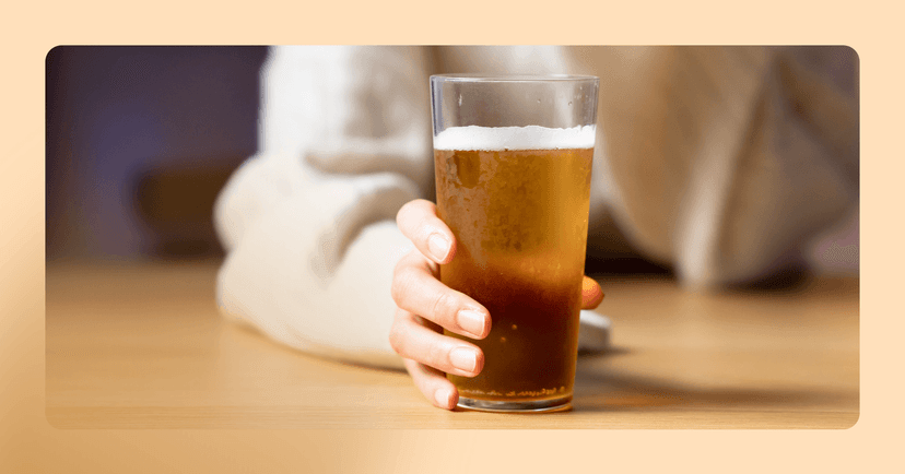 woman having a drink and experiencing temporary excitement