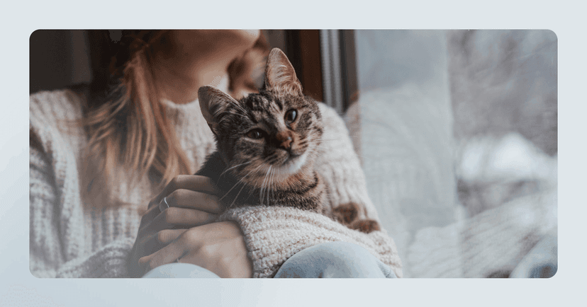 woman spending quality time with her cat