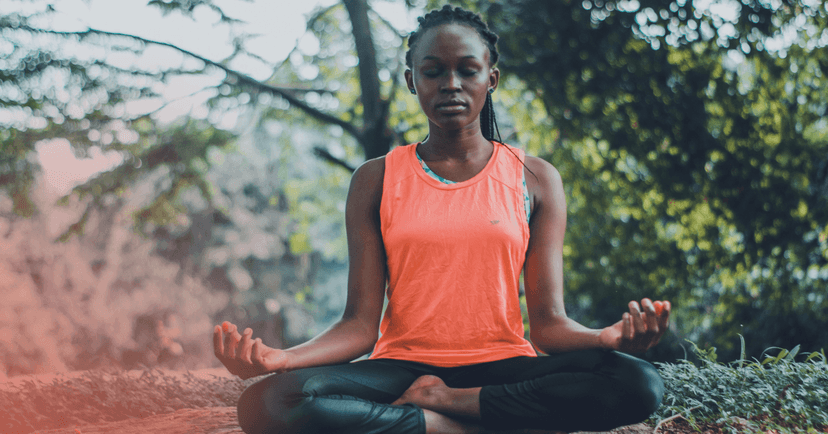 woman taking a break from screens and meditating for her mental health
