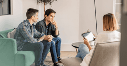 a couple working on conflict in PACT therapy