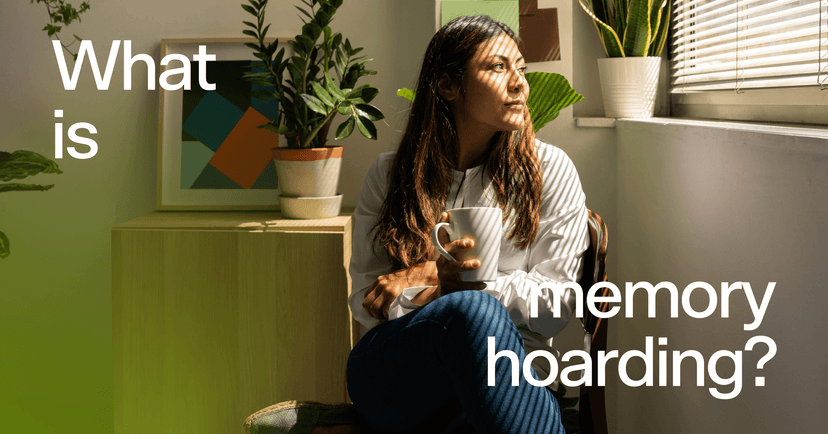 memory hoarding woman with coffee looking out the window with text 'What is memory hoarding?'