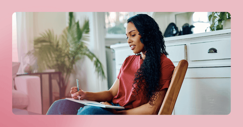 woman practicing gratitude and writing down things about her partner that she is grateful for