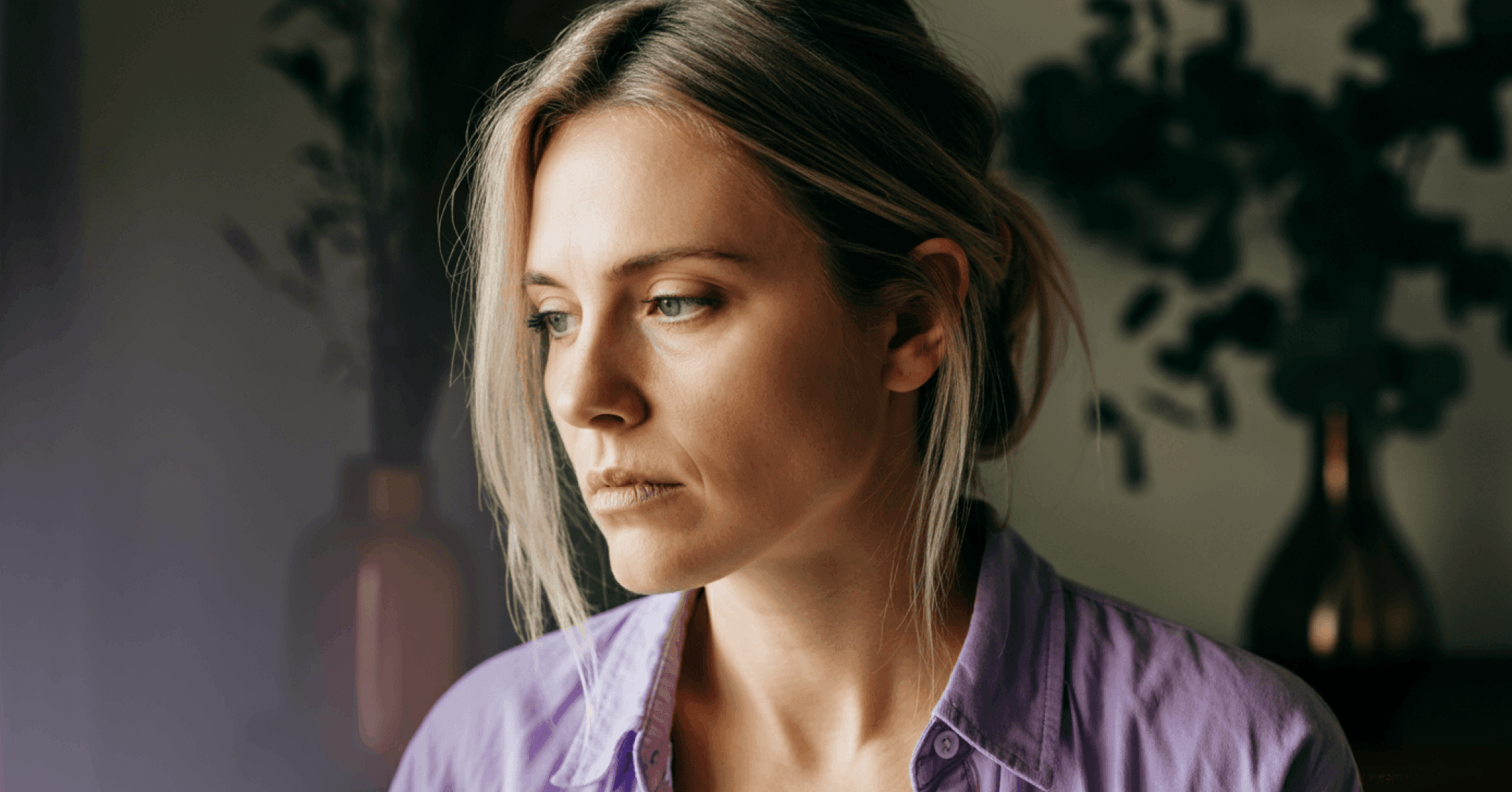 woman feeling detached from herself and her surroundings