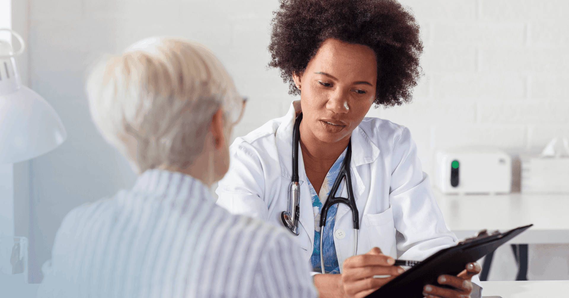 woman asking her provider for treatment plan clarification