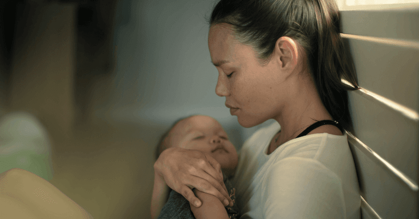 woman becoming impatient with her baby due to postpartum rage