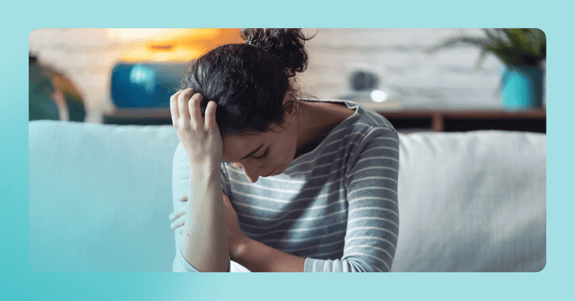 woman with anxiety trying to ground herself by focusing on her senses