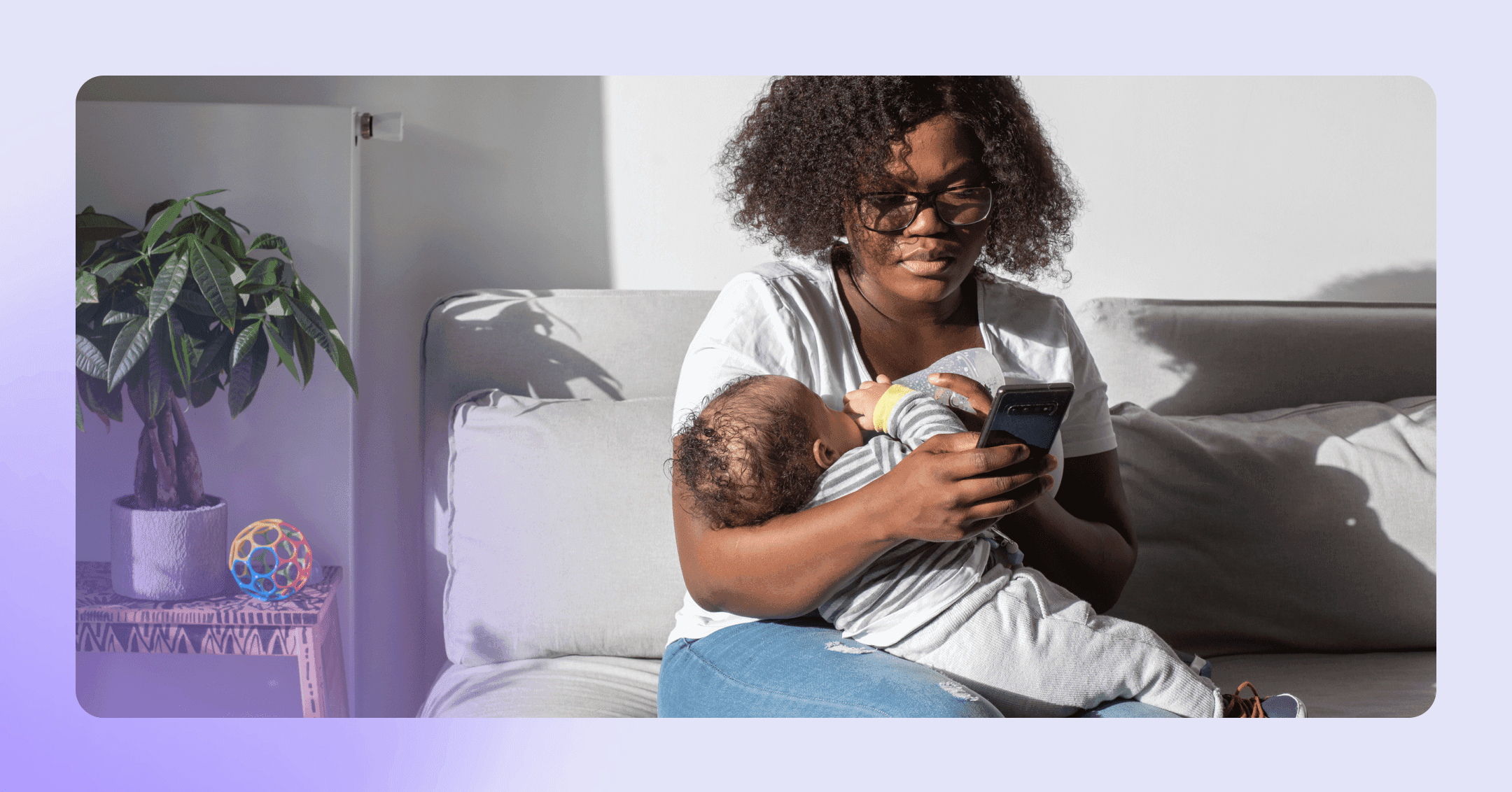 woman having postpartum intrusive thoughts while holding her baby