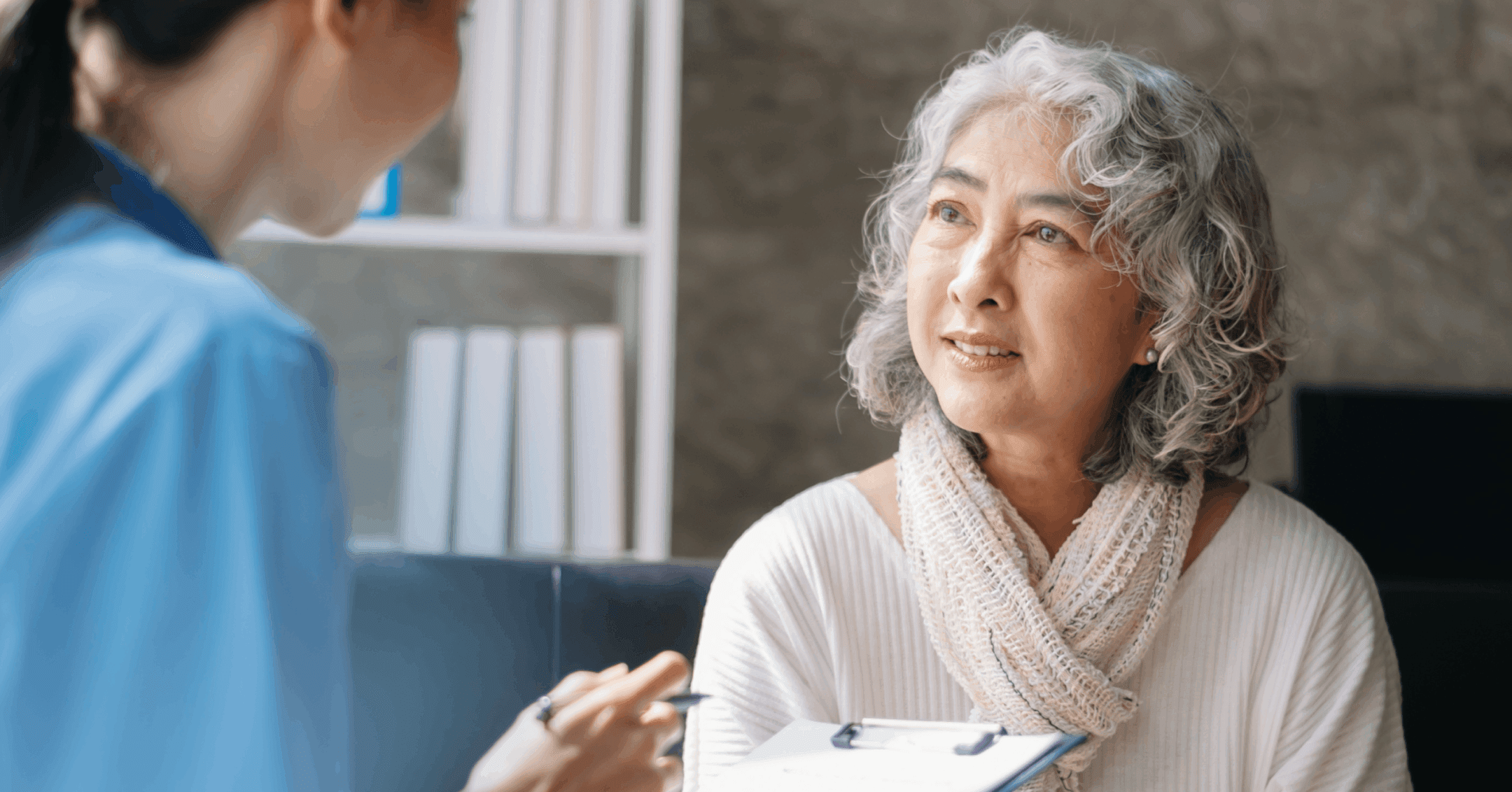 older woman with anxiety meeting with a psychiatric provider