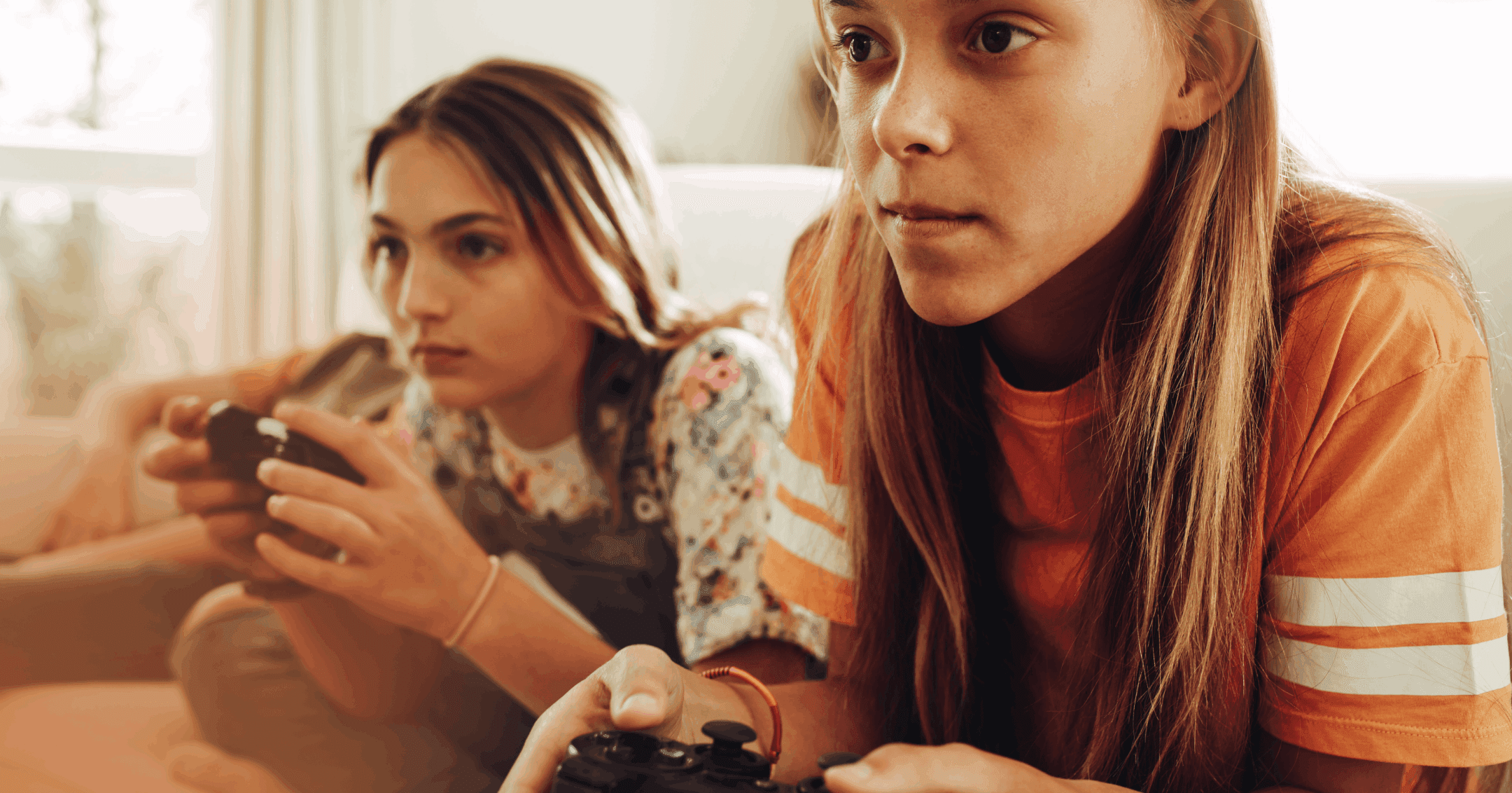 two girls playing video games to have fun before switching to a new task