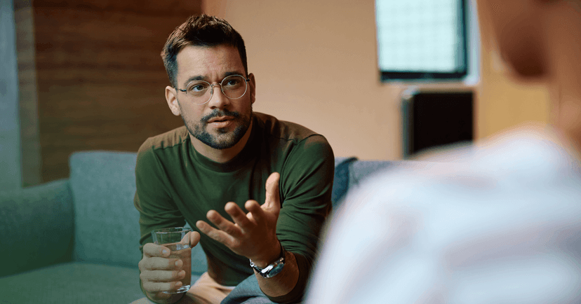 man with depression discussing medication management with his psychiatrist