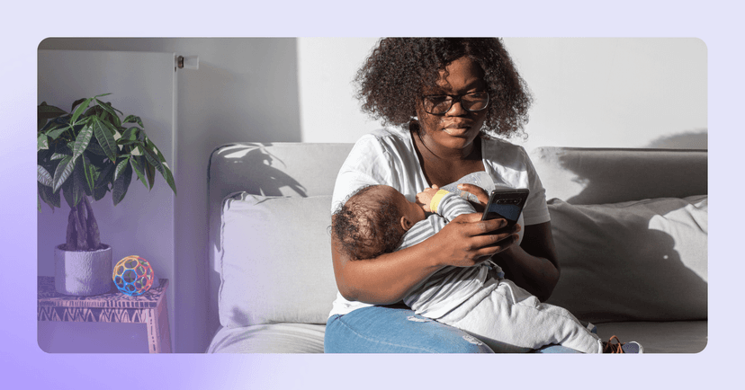woman having postpartum intrusive thoughts while holding her baby