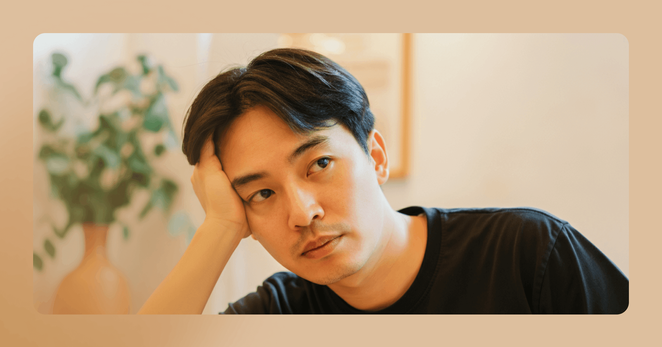 man with depression looks off to the left