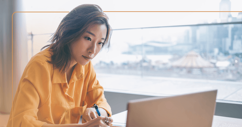 woman keeping a record of dealing with passive-aggressive emails at work