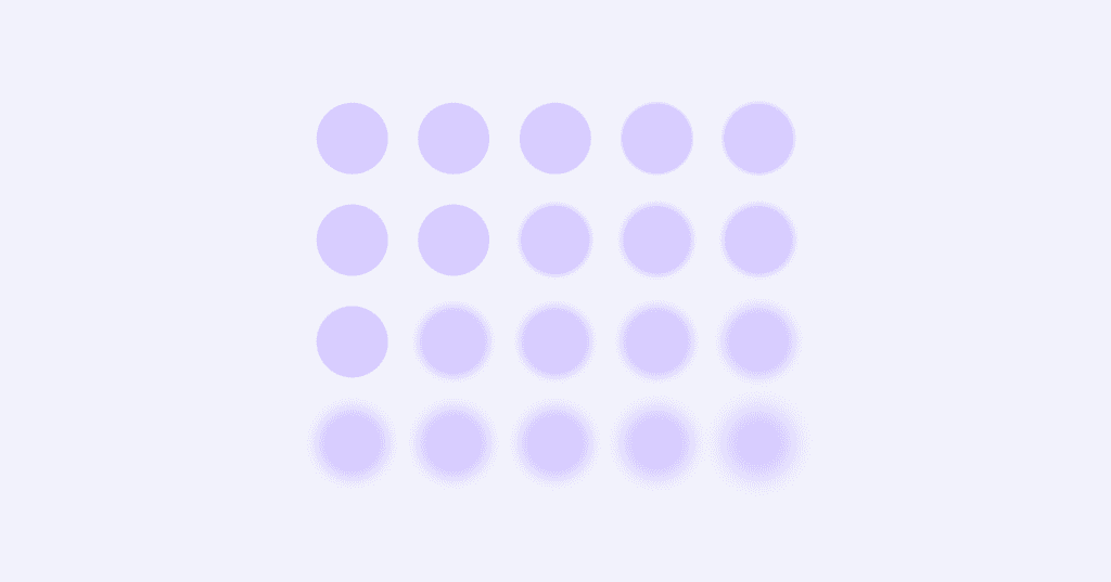 Image shows small lavender circles. The circles are all the same size in rows. On the left side of the screen, the circles are in sharp focus. On the right side, the circles are blurry.