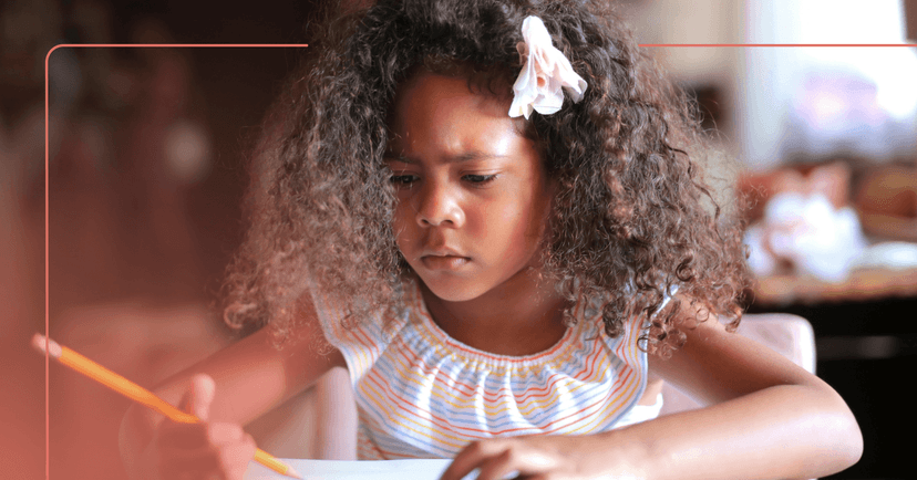 young girl with neurodevelopmental disorder having difficulty writing