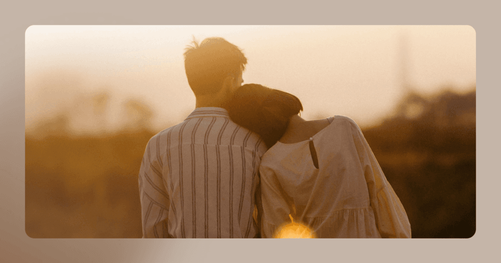 a couple enjoys a sunset together after talking about PTSD