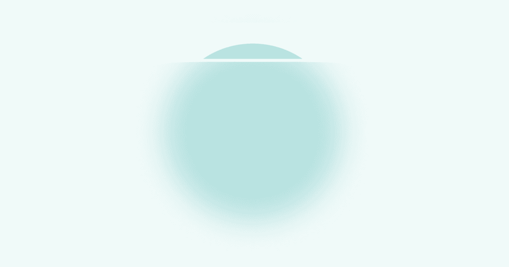 Image shows a blue circle. Almost all the way to the top of the circle is a horizontal white line that goes through the circle. Above the white line, the circle is in sharp focus. Below the white line, the circle is blurry.