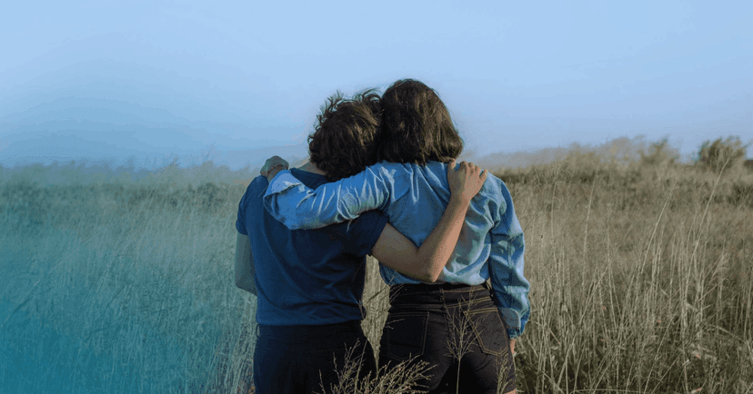 two friends in a quiet private location talking about self-harm