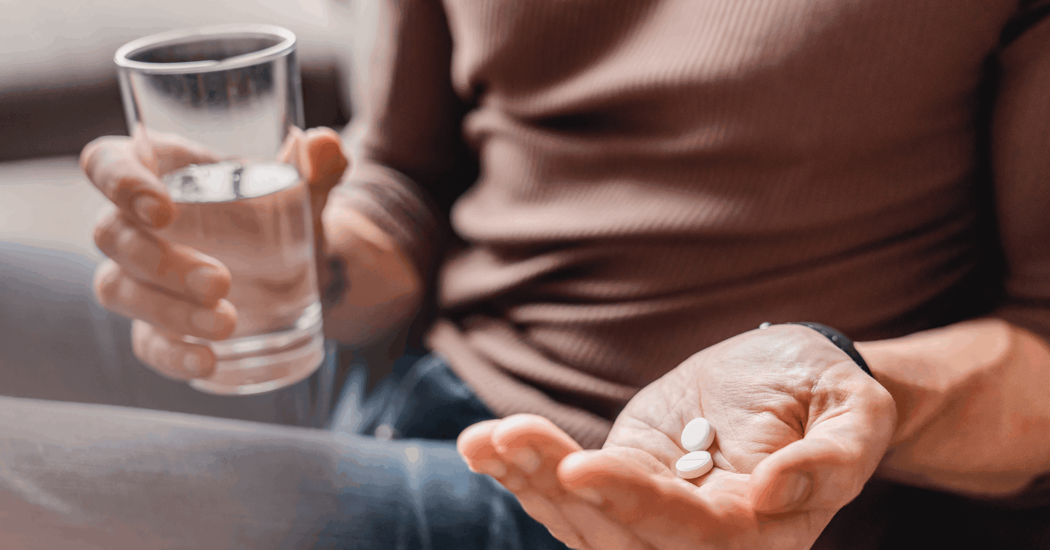 man with anxiety taking medication after meeting with a psychiatrist