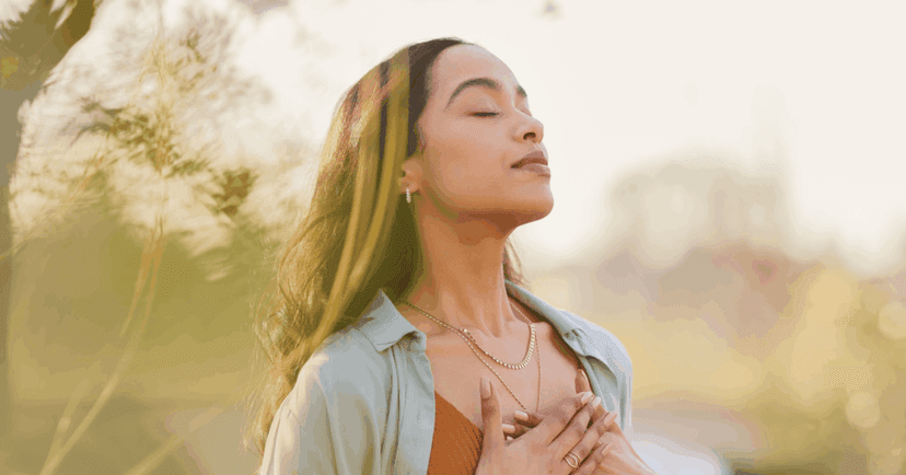 woman pausing and taking a breath to avoid responding in anger