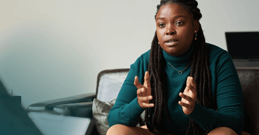 woman seeing a psychiatrist after explaining it is an emergency
