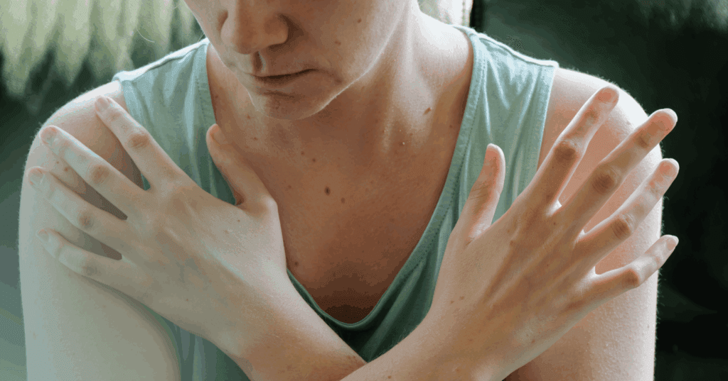 woman engaging in MBSR through a sitting meditation